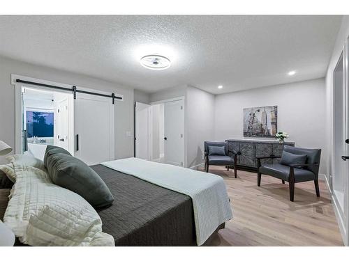 436 Woodbriar Place Sw, Calgary, AB - Indoor Photo Showing Bedroom