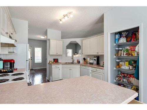 219 Citadel Lane Nw, Calgary, AB - Indoor Photo Showing Kitchen With Double Sink