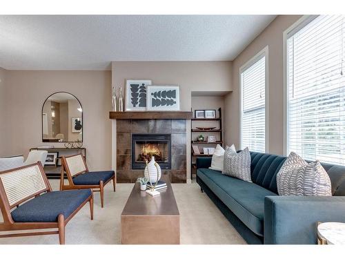 1303-155 Silverado Skies Link Sw, Calgary, AB - Indoor Photo Showing Living Room With Fireplace