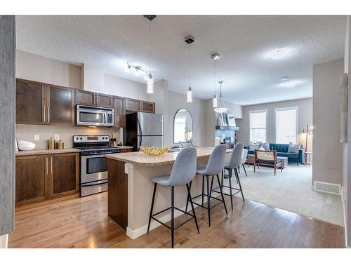 1303-155 Silverado Skies Link Sw, Calgary, AB - Indoor Photo Showing Kitchen With Stainless Steel Kitchen With Upgraded Kitchen