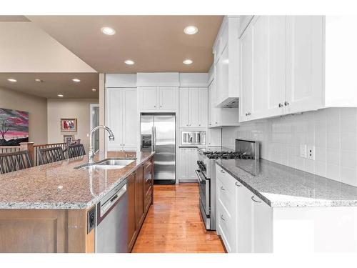 224 Clearwater Way, Rural Rocky View County, AB - Indoor Photo Showing Kitchen With Double Sink With Upgraded Kitchen