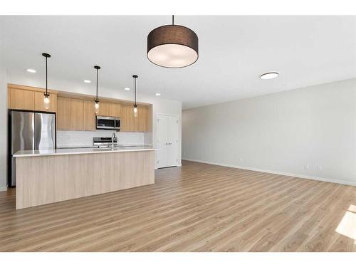 1207-220 Seton Grove Se, Calgary, AB - Indoor Photo Showing Kitchen