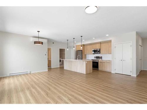 1207-220 Seton Grove Se, Calgary, AB - Indoor Photo Showing Kitchen