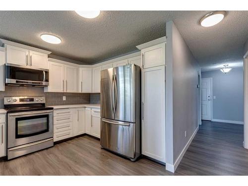 344-7030 Coach Hill Road Sw, Calgary, AB - Indoor Photo Showing Kitchen