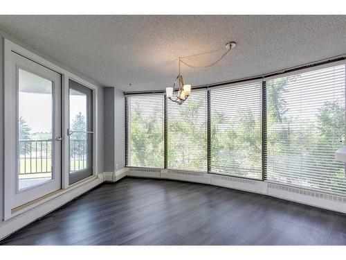 344-7030 Coach Hill Road Sw, Calgary, AB - Indoor Photo Showing Other Room