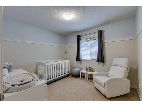 85 Aspenshire Crescent Sw, Calgary, AB - Indoor Photo Showing Bedroom