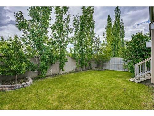 85 Aspenshire Crescent Sw, Calgary, AB - Outdoor With Backyard