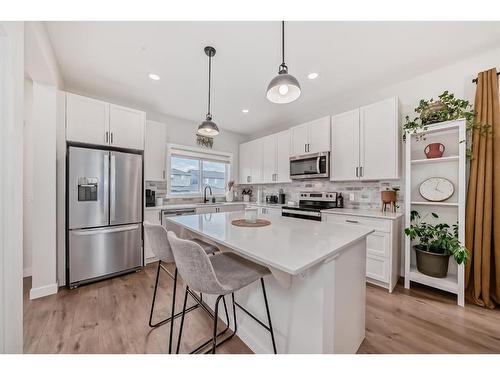 56 Legacy Reach View Se, Calgary, AB - Indoor Photo Showing Kitchen With Stainless Steel Kitchen With Upgraded Kitchen