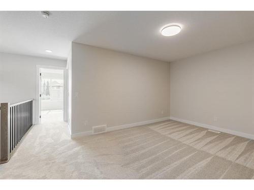 207 Silver Spruce Grove Sw, Calgary, AB - Indoor Photo Showing Other Room