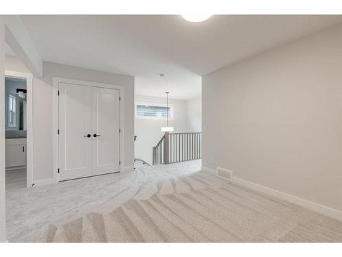 207 Silver Spruce Grove Sw, Calgary, AB - Indoor Photo Showing Other Room