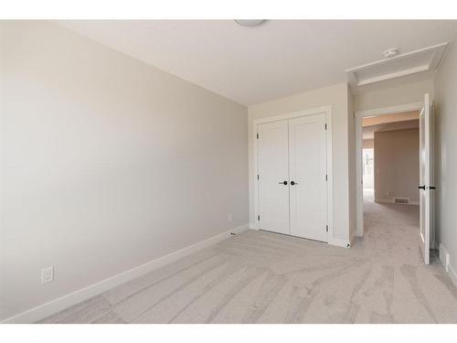 207 Silver Spruce Grove Sw, Calgary, AB - Indoor Photo Showing Other Room