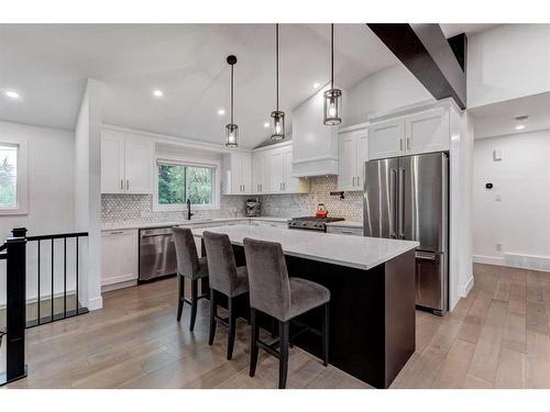 14 Butte Place Nw, Calgary, AB - Indoor Photo Showing Kitchen With Stainless Steel Kitchen With Upgraded Kitchen