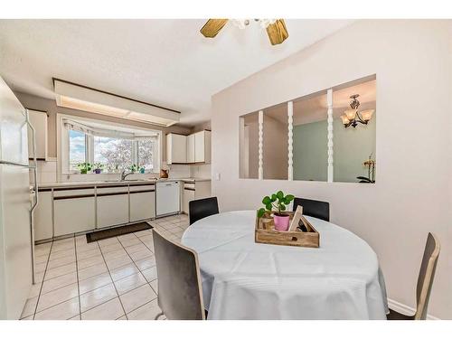 12132 Canfield Road Sw, Calgary, AB - Indoor Photo Showing Dining Room