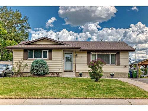 12132 Canfield Road Sw, Calgary, AB - Outdoor With Facade