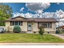 12132 Canfield Road Sw, Calgary, AB  - Outdoor With Facade 