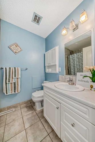12132 Canfield Road Sw, Calgary, AB - Indoor Photo Showing Bathroom