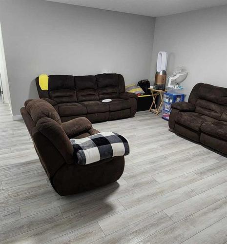240 Creekstone Row Sw, Calgary, AB - Indoor Photo Showing Living Room