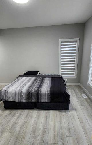 240 Creekstone Row Sw, Calgary, AB - Indoor Photo Showing Bedroom