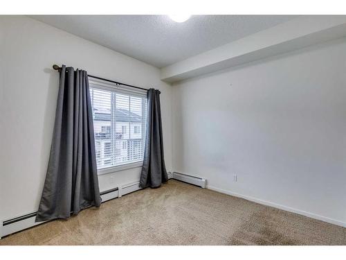 6402-755 Copperpond Boulevard Se, Calgary, AB - Indoor Photo Showing Other Room
