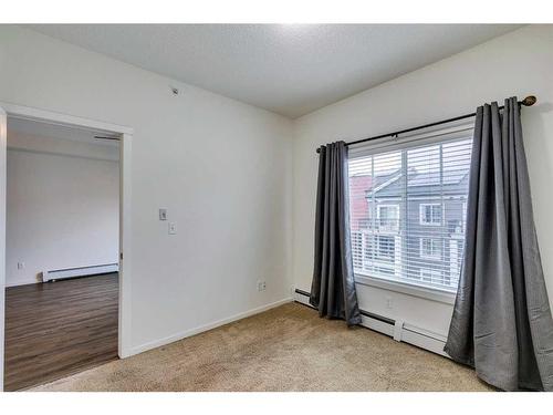 6402-755 Copperpond Boulevard Se, Calgary, AB - Indoor Photo Showing Other Room
