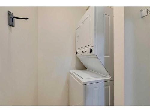 6402-755 Copperpond Boulevard Se, Calgary, AB - Indoor Photo Showing Laundry Room