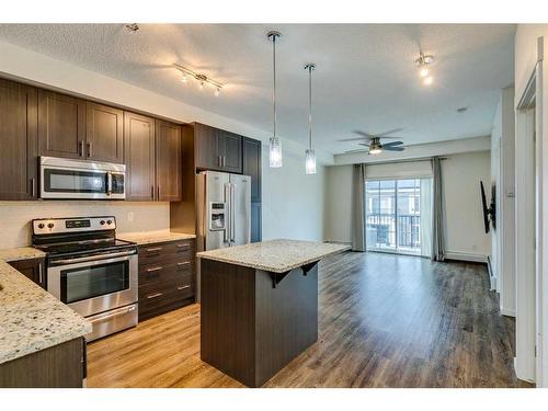 6402-755 Copperpond Boulevard Se, Calgary, AB - Indoor Photo Showing Kitchen With Stainless Steel Kitchen With Upgraded Kitchen