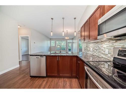 235-4303 1 Street Ne, Calgary, AB - Indoor Photo Showing Kitchen With Upgraded Kitchen