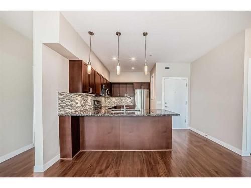 235-4303 1 Street Ne, Calgary, AB - Indoor Photo Showing Kitchen With Upgraded Kitchen