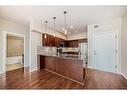 235-4303 1 Street Ne, Calgary, AB  - Indoor Photo Showing Kitchen 