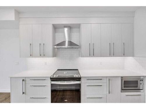 191 Dawson Wharf Rise, Chestermere, AB - Indoor Photo Showing Kitchen With Upgraded Kitchen