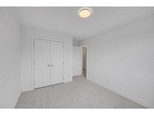 191 Dawson Wharf Rise, Chestermere, AB - Indoor Photo Showing Other Room