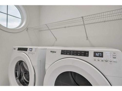 191 Dawson Wharf Rise, Chestermere, AB - Indoor Photo Showing Laundry Room