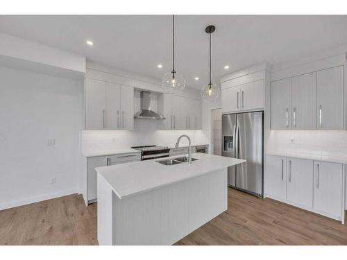 191 Dawson Wharf Rise, Chestermere, AB - Indoor Photo Showing Kitchen With Stainless Steel Kitchen With Double Sink With Upgraded Kitchen