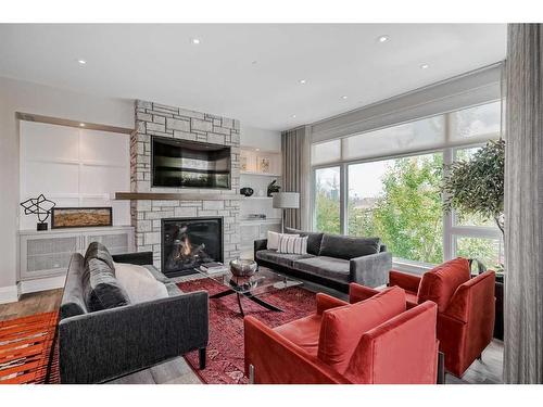 204-3030 17 Street Sw, Calgary, AB - Indoor Photo Showing Living Room With Fireplace