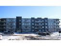 311-80 Carrington Plaza Nw, Calgary, AB  - Outdoor With Balcony With Facade 