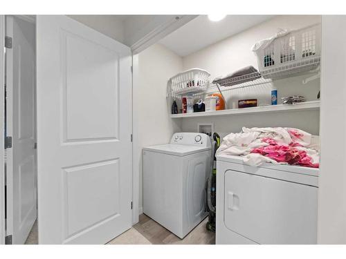 275 Lucas Boulevard Nw, Calgary, AB - Indoor Photo Showing Laundry Room