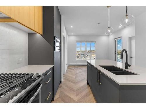 406-4275 Norford Avenue Nw, Calgary, AB - Indoor Photo Showing Kitchen With Double Sink With Upgraded Kitchen