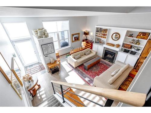 114 18 Avenue Se, Calgary, AB - Indoor Photo Showing Living Room With Fireplace