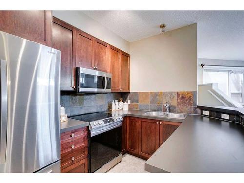 22-2040 35 Avenue Sw, Calgary, AB - Indoor Photo Showing Kitchen With Double Sink