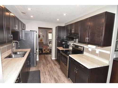 79 Abingdon Way Ne, Calgary, AB - Indoor Photo Showing Kitchen With Double Sink With Upgraded Kitchen