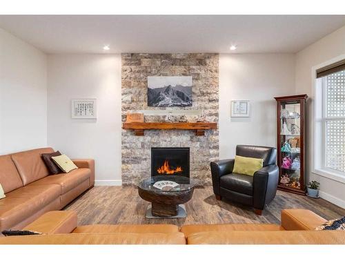 216 Cranarch Crescent Se, Calgary, AB - Indoor Photo Showing Living Room With Fireplace