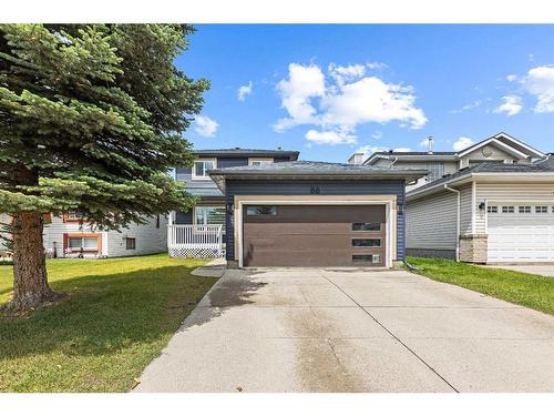 88 Riverglen Drive Se, Calgary, AB - Outdoor With Facade