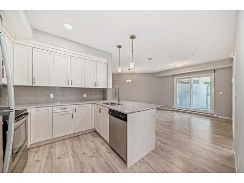 325-20 Seton Park Se, Calgary, AB - Indoor Photo Showing Kitchen With Stainless Steel Kitchen With Upgraded Kitchen