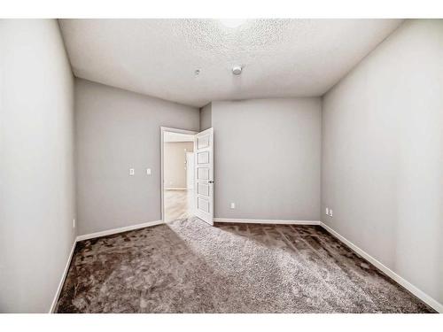 325-20 Seton Park Se, Calgary, AB - Indoor Photo Showing Other Room