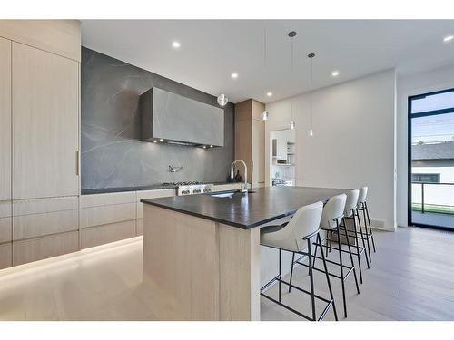 404 21 Avenue Nw, Calgary, AB - Indoor Photo Showing Kitchen With Double Sink