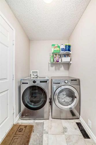 50 Covewood Circle Ne, Calgary, AB - Indoor Photo Showing Laundry Room