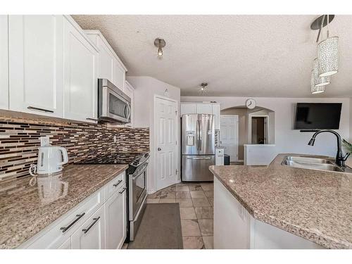 50 Covewood Circle Ne, Calgary, AB - Indoor Photo Showing Kitchen With Double Sink With Upgraded Kitchen