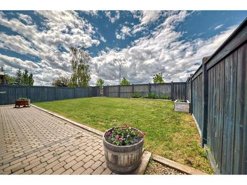 272 Springmere  Way, Chestermere, AB - Outdoor With Backyard