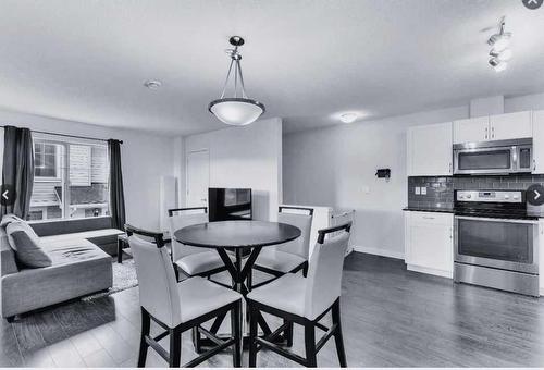 106-250 Sage Valley Road Nw, Calgary, AB - Indoor Photo Showing Kitchen