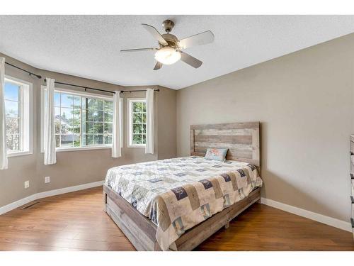 285 Hidden Spring Green Nw, Calgary, AB - Indoor Photo Showing Bedroom